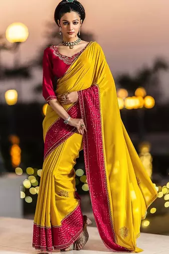 yellow embellished crepe saree with unstitched blouse piece