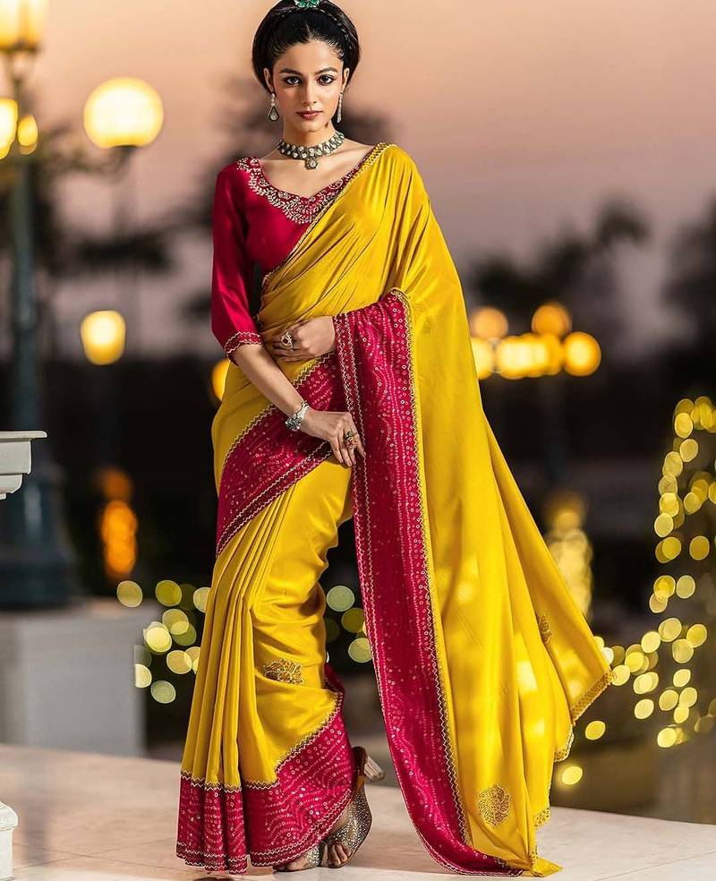 yellow embellished crepe saree with unstitched blouse piece