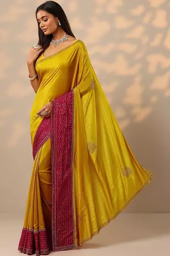 yellow embellished crepe saree with unstitched blouse piece