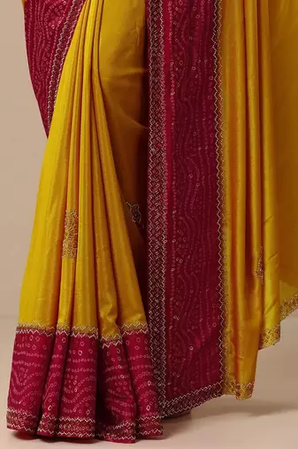 yellow embellished crepe saree with unstitched blouse piece