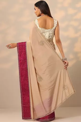 beige embellished crepe saree with unstitched blouse piece