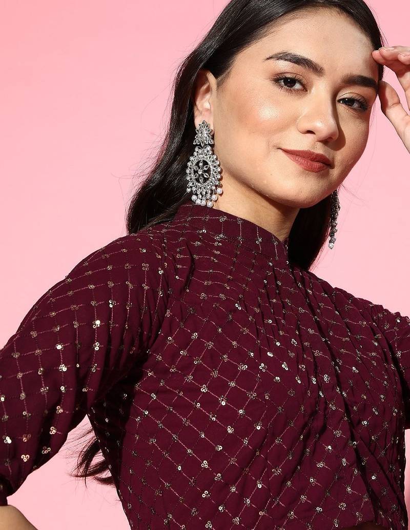 burgundy solid saree with embellished blouse