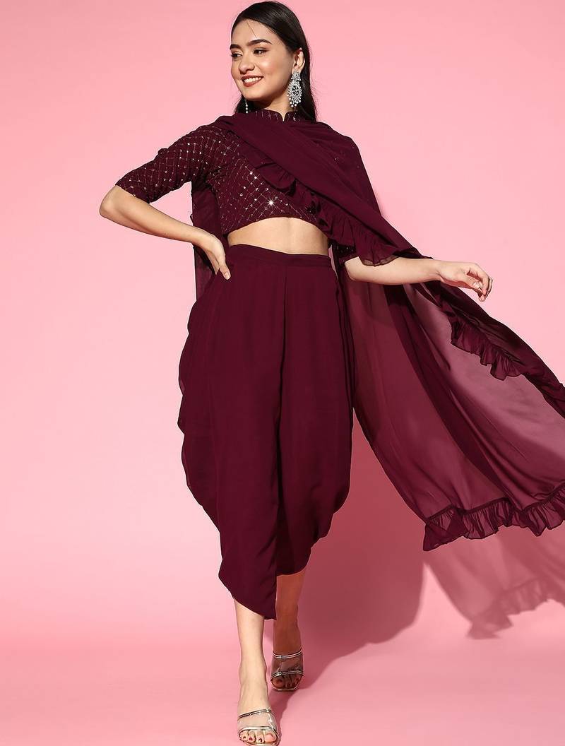 burgundy solid saree with embellished blouse