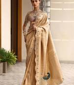 gold woven design saree with unstitched blouse piece