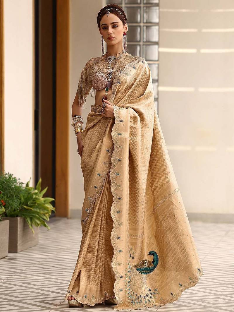 gold woven design saree with unstitched blouse piece