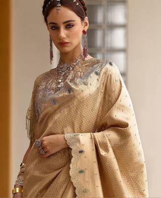 gold woven design saree with unstitched blouse piece 4