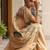 gold woven design saree with unstitched blouse piece