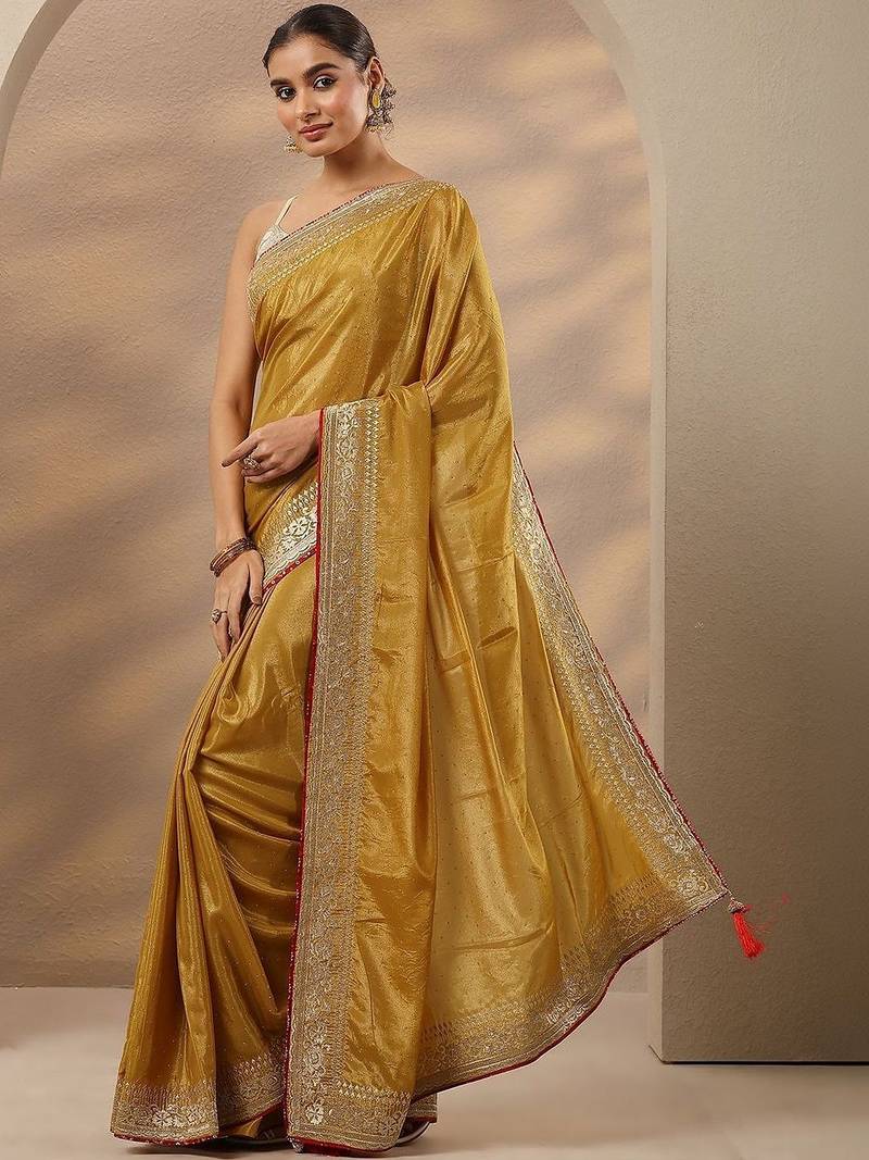 mustard embellished saree with unstitched blouse piece