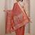 rust ethnic motif woven design saree with unstitched blouse piece