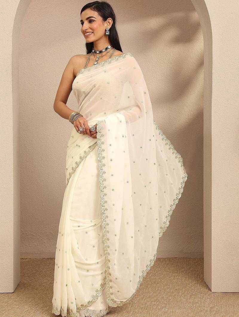 off white embroidered georgette saree with unstitched blouse piece