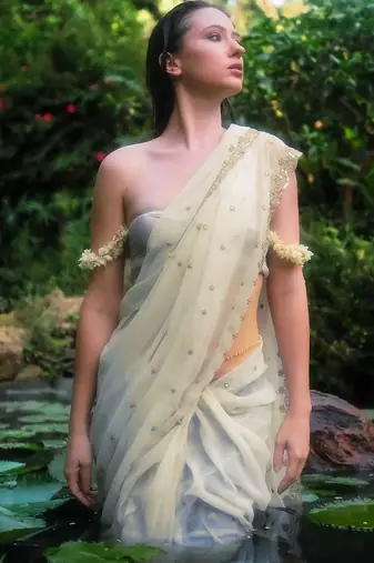 off white embroidered georgette saree with unstitched blouse piece