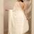 off white embroidered georgette saree with unstitched blouse piece