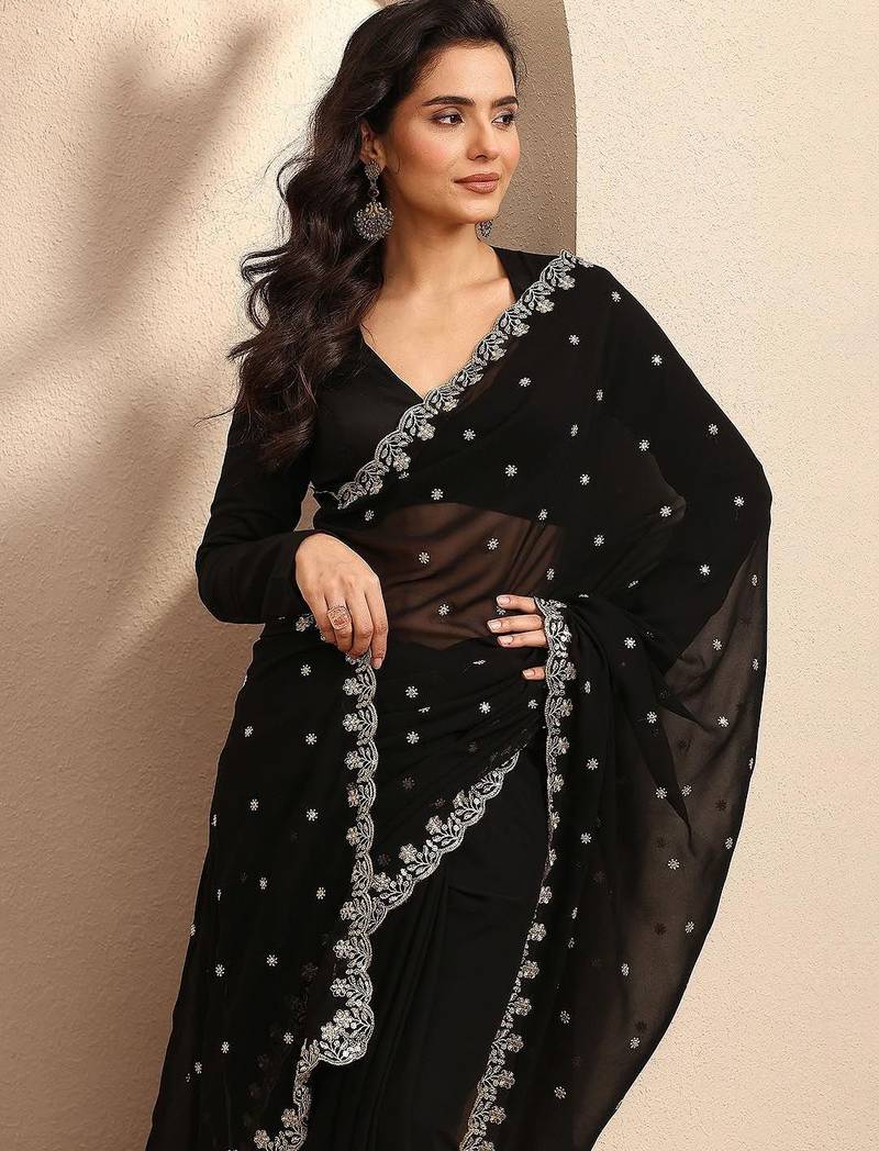 black embroidered georgette saree with unstitched blouse piece