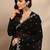 black embroidered georgette saree with unstitched blouse piece