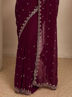 maroon embroidered georgette saree with unstitched blouse piece 4