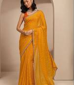 yellow printed saree with unstitched blouse piece