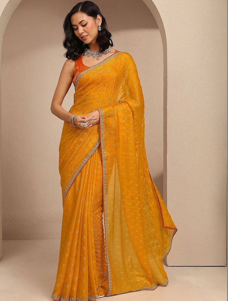 yellow printed saree with unstitched blouse piece
