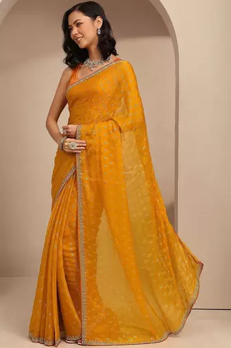 yellow printed saree with unstitched blouse piece