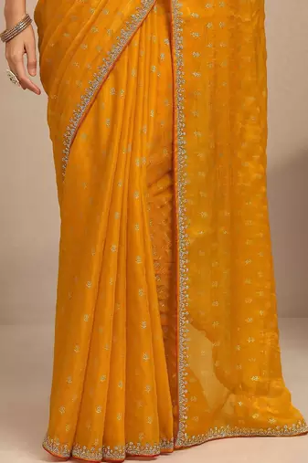 yellow printed saree with unstitched blouse piece