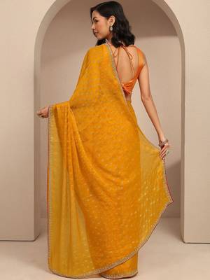 yellow printed saree with unstitched blouse piece 5