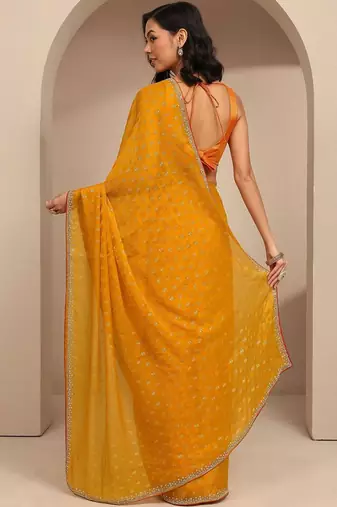 yellow printed saree with unstitched blouse piece