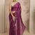 purple floral motif printed saree with embellished border and a blouse piece