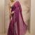 purple floral motif printed saree with embellished border and a blouse piece