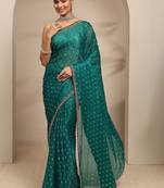 Teal blue floral printed saree with unstitched blouse piece