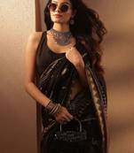 black printed saree with unstitched blouse piece
