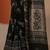 black printed saree with unstitched blouse piece
