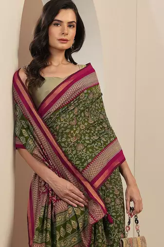 green printed saree with unstitched blouse piece