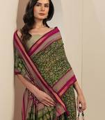 green printed saree with unstitched blouse piece