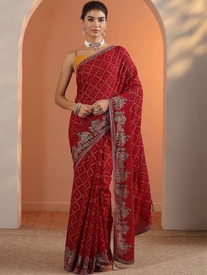Red red printed georgette saree with unstitched blouse piece 1