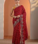 Red red printed georgette saree with unstitched blouse piece