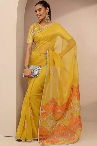 yellow embellished saree with unstitched blouse piece
