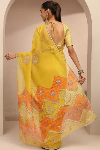 yellow embellished saree with unstitched blouse piece