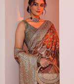 pink woven design saree with unstitched blouse piece