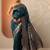 teal woven design banarasi saree with unstitched blouse piece