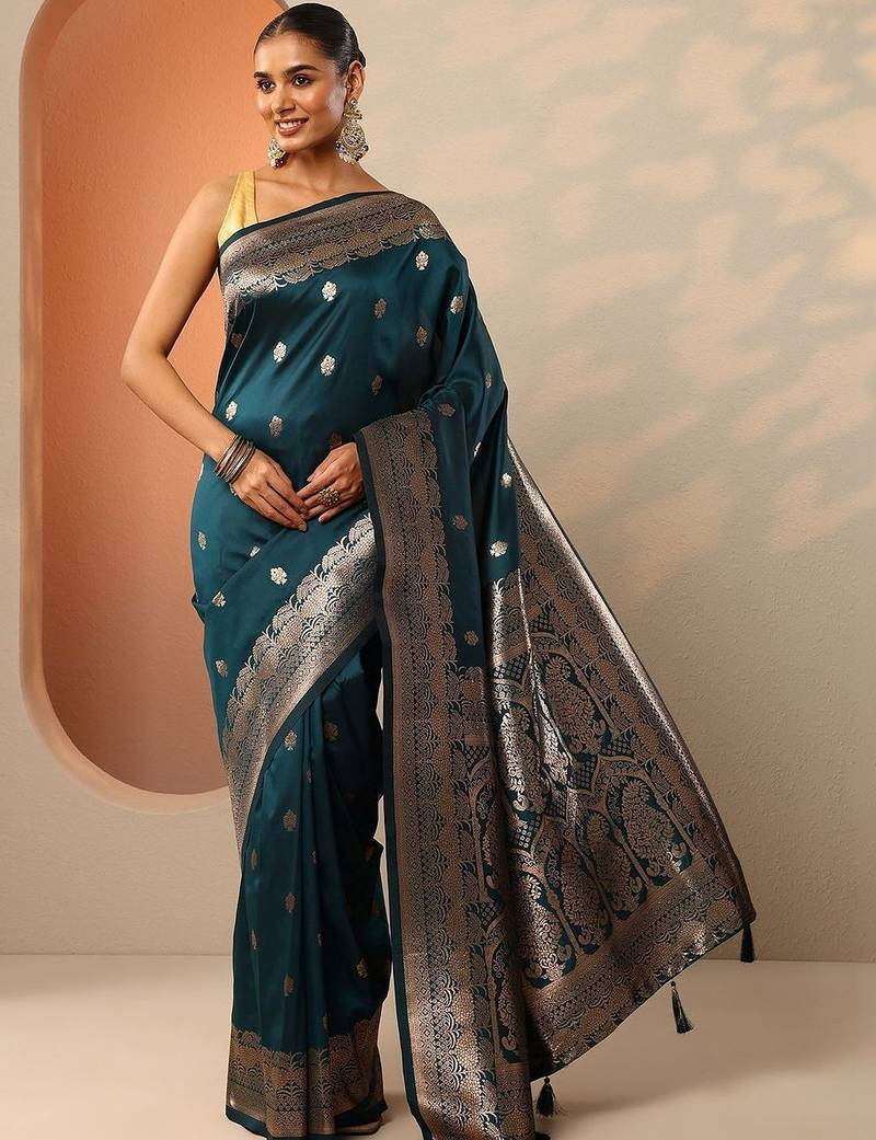 teal woven design banarasi saree with unstitched blouse piece