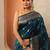 teal woven design banarasi saree with unstitched blouse piece