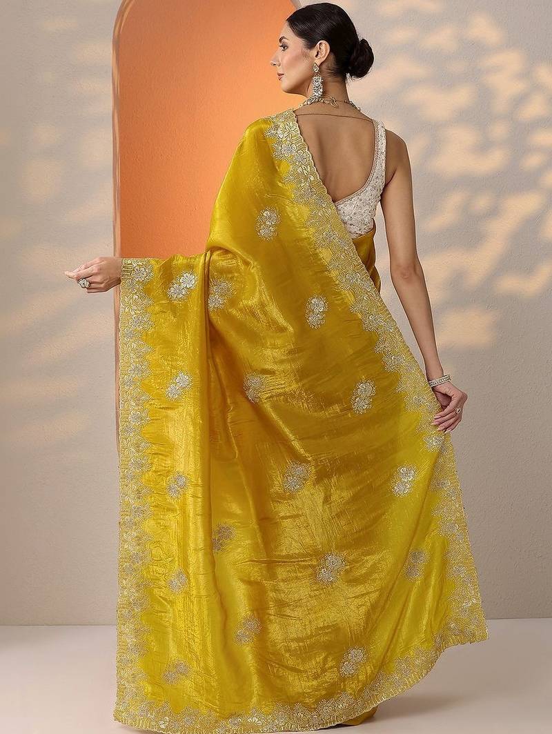 yellow embroidered banarasi organza saree with unstitched blouse piece