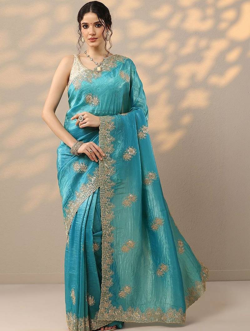 blue embroidered organza saree with unstitched blouse piece