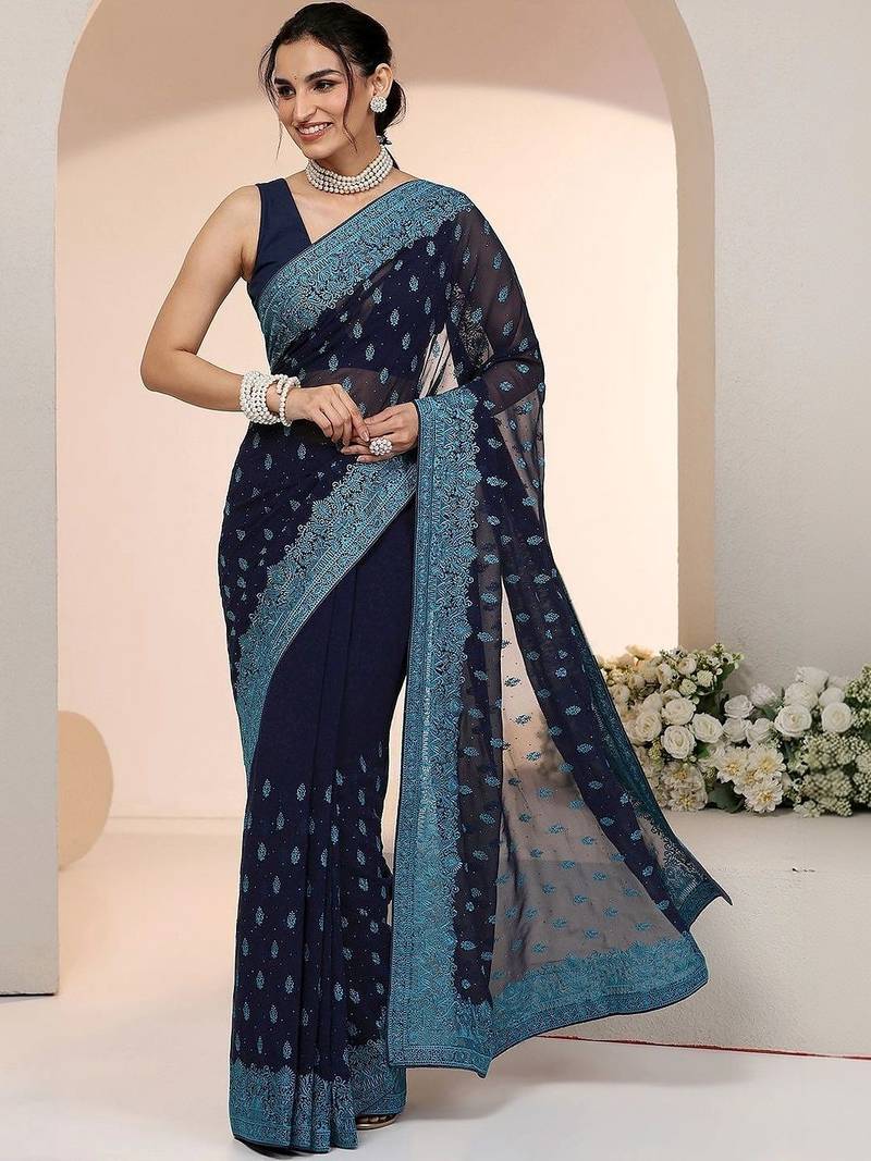 navy blue embroidered georgette saree with ethnic motifs
