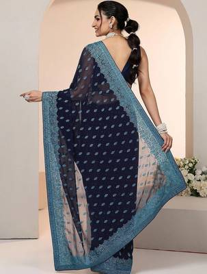 navy blue embroidered georgette saree with ethnic motifs 2