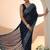 navy blue embroidered georgette saree with ethnic motifs
