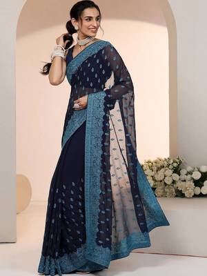 navy blue embroidered georgette saree with ethnic motifs 4