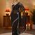 black floral embellished georgette saree