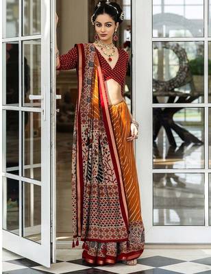 Mustard mustard leheriya printed cotton blend saree with unstitched blouse piece 1