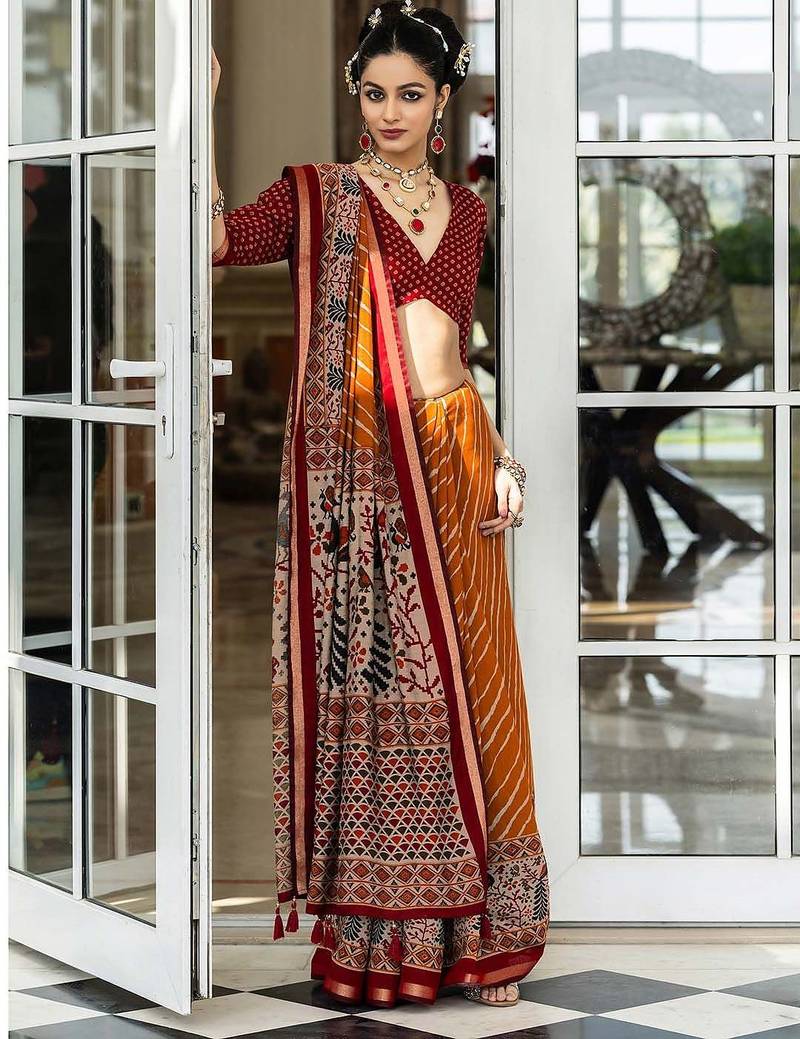 Mustard mustard leheriya printed cotton blend saree with unstitched blouse piece