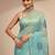 teal ethnic motif beads embellished saree with embellished border and a blouse piece